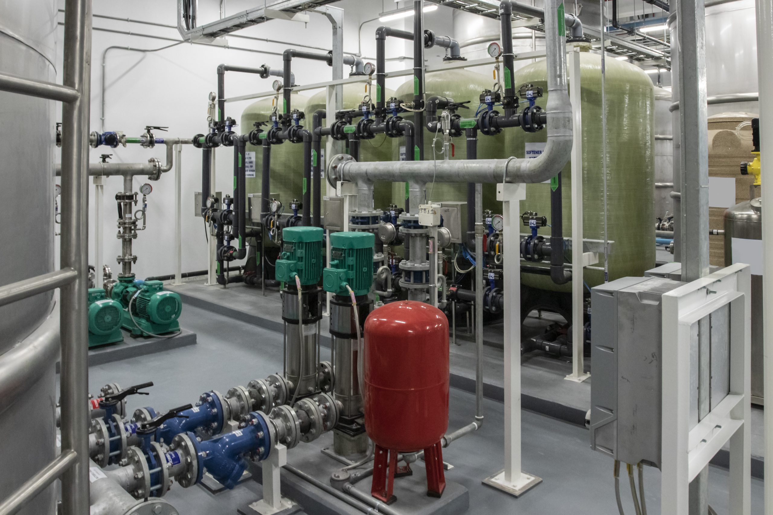 Typical installation of softener water tank with mixixed chemical and salt water tank